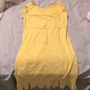 Ruffle sleeveless dress with white polka dots